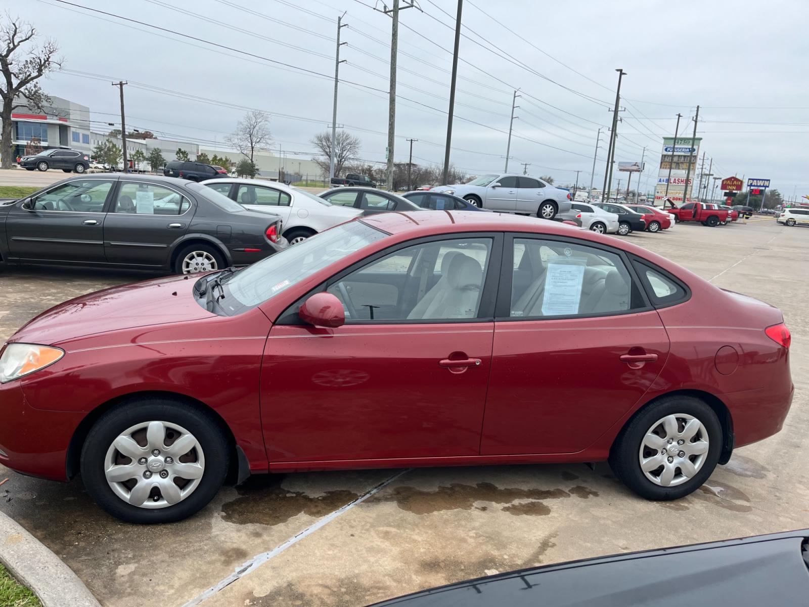 2008 red /TAN Hyundai Elantra GLS (KMHDU46D78U) with an 2.0L L4 DOHC 16V engine, Manual transmission, located at 14700 Tomball Parkway 249, Houston, TX, 77086, (281) 444-2200, 29.928619, -95.504074 - Photo #3
